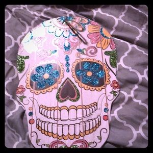 A wall decoration of a sugar skull